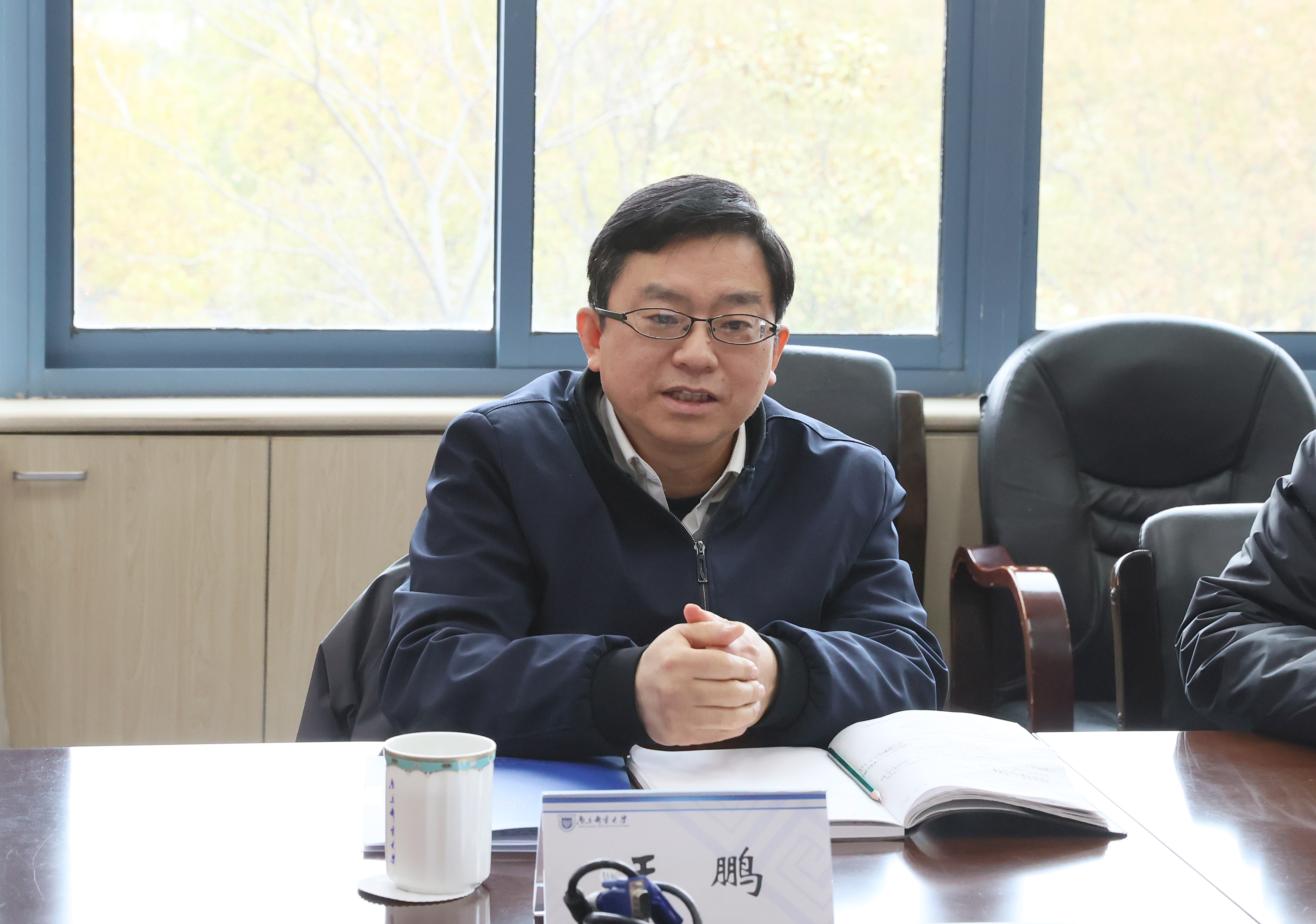 省通信管理局王鹏副局长一行来校调研